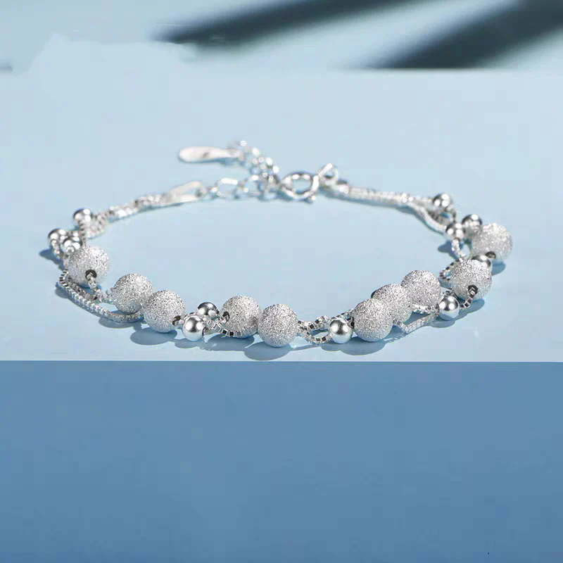 BRACCIALE LUMINOSO MADREPERLA