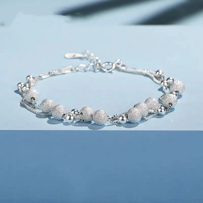 BRACCIALE LUMINOSO MADREPERLA
