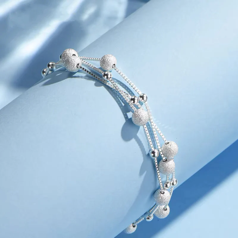 BRACCIALE LUMINOSO MADREPERLA