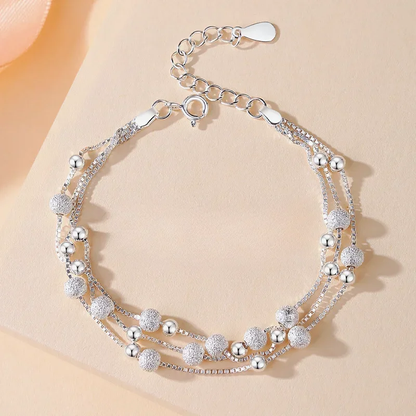 BRACCIALE LUMINOSO MADREPERLA